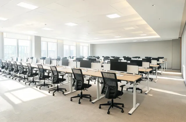 Modern open office with consistent Herman Miller ergonomic task chairs and sit-stand desks
